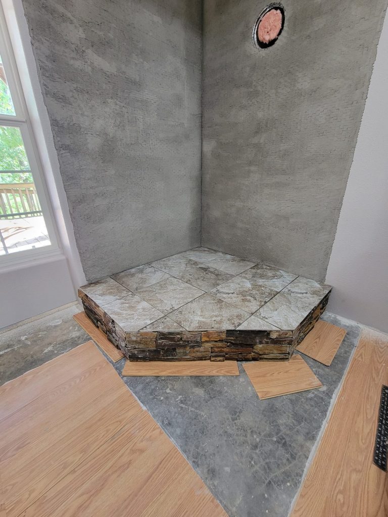 Stone veneer mortar scratch coat over the mesh